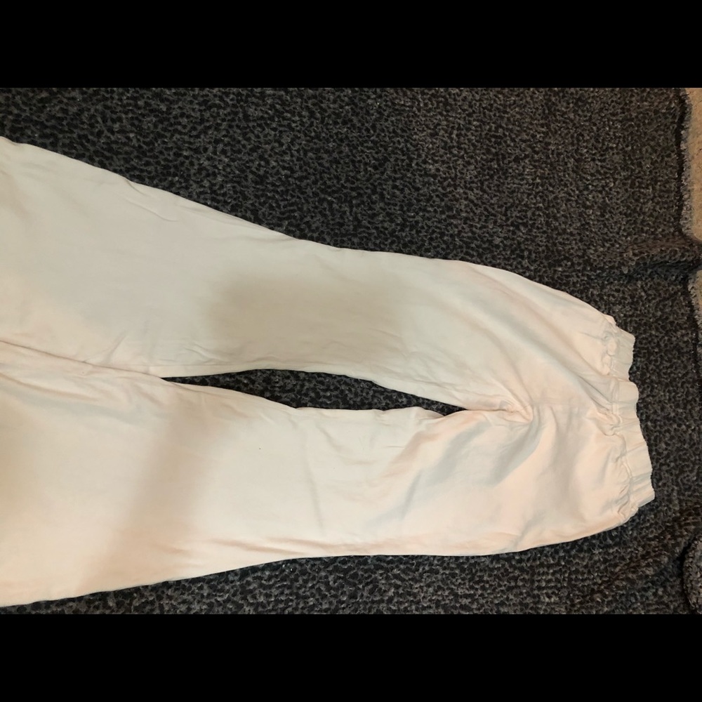 Umgee brand size small white flare pants.